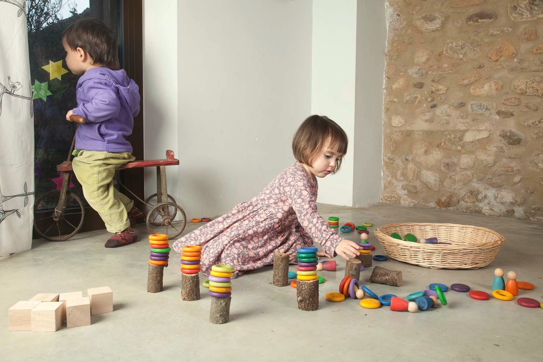 Grapat - Houten nins poppetjes met ringen en schijven